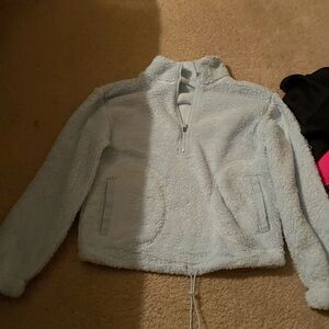 Blue Teddy Jacket with High Collar and Zip-Up Closure